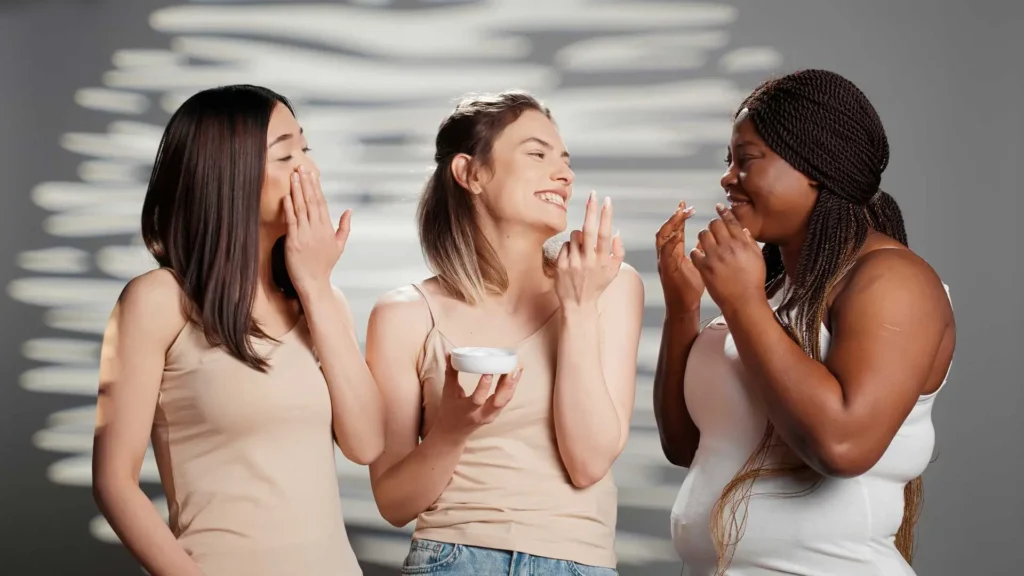 group of beautiful girls applying moisturizing cre 2023 11 27 05 14 04 utc